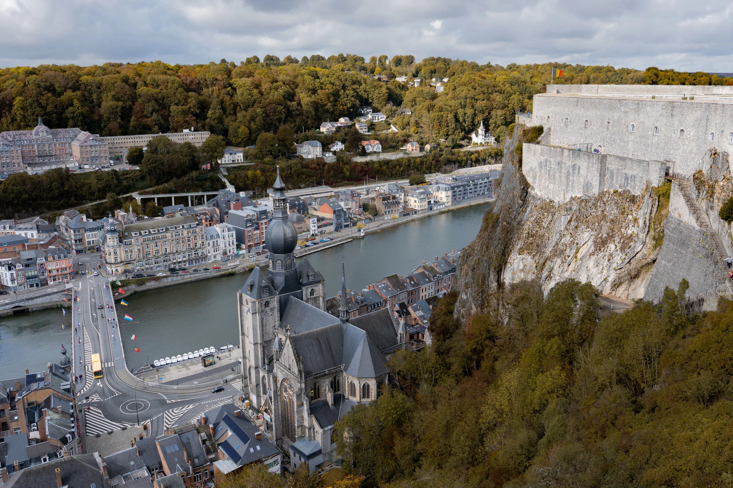 View from the Citadel of Dinant over the Meuse bending through town, the Collegiate Church below the cliff.